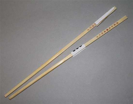A pair of early 20th century ivory chopsticks